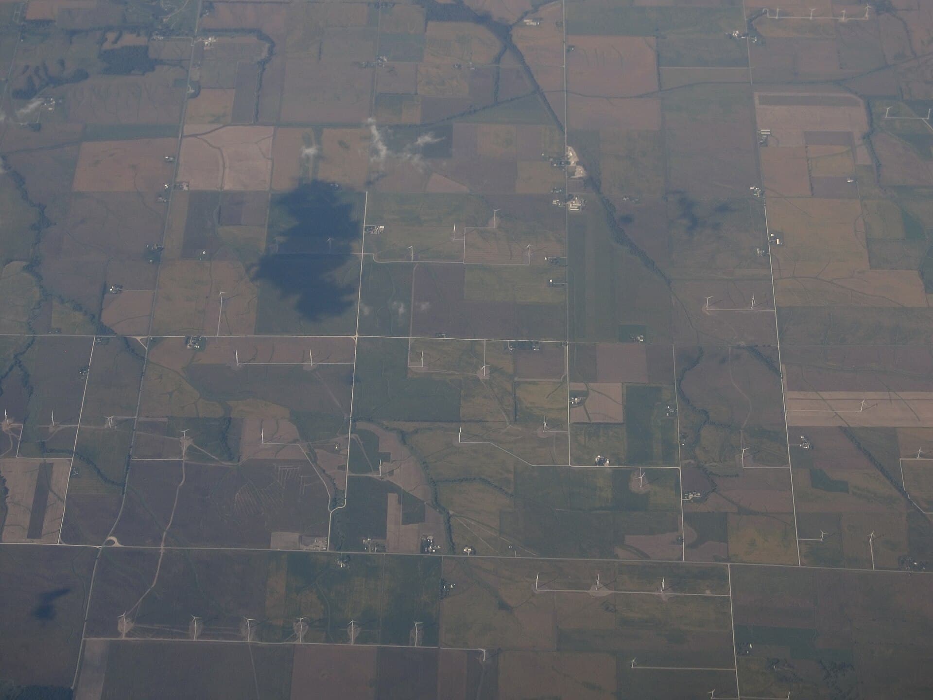 Onshore wind turbines across open ground